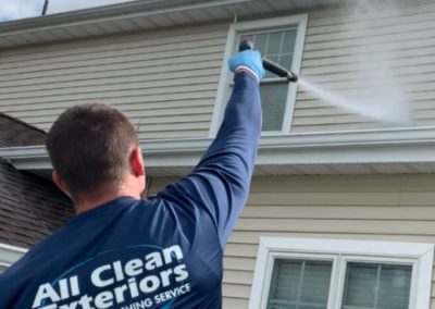 employee soft wash power washing vinyl siding in Fair Haven, NJ