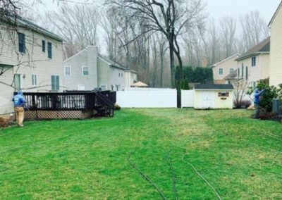 two employees power washing different houses at the sametime in Atlantic Highlands, NJ