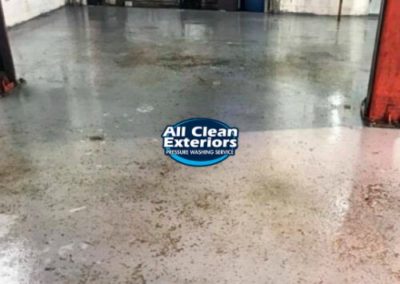 cleaning dirt and oil off a garage floor in Long Branch, NJ