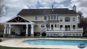 Power Washing a house with vinyl siding in monmouth county to increase property value