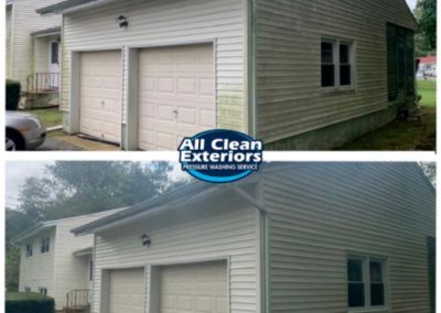 before and after power washing of green stuff on vinyl siding garage in Shrewsbury, NJ