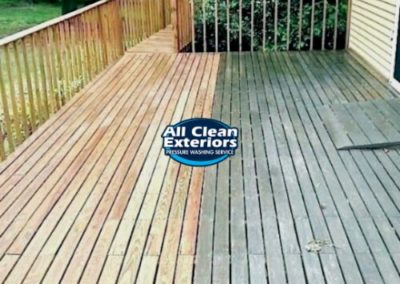 cleaning a wooden deck with power washing in Oceanport, NJ