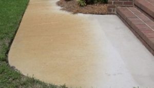 Concrete Rust on Walkway Before Power Washing